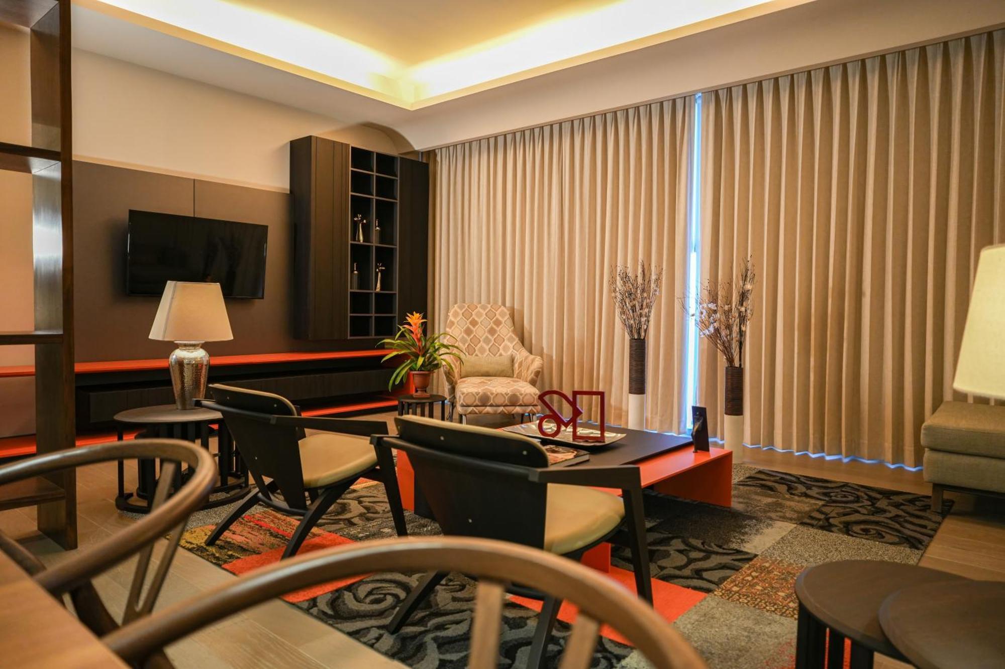 Metria Hotel León Dış mekan fotoğraf A living room in a condominium
